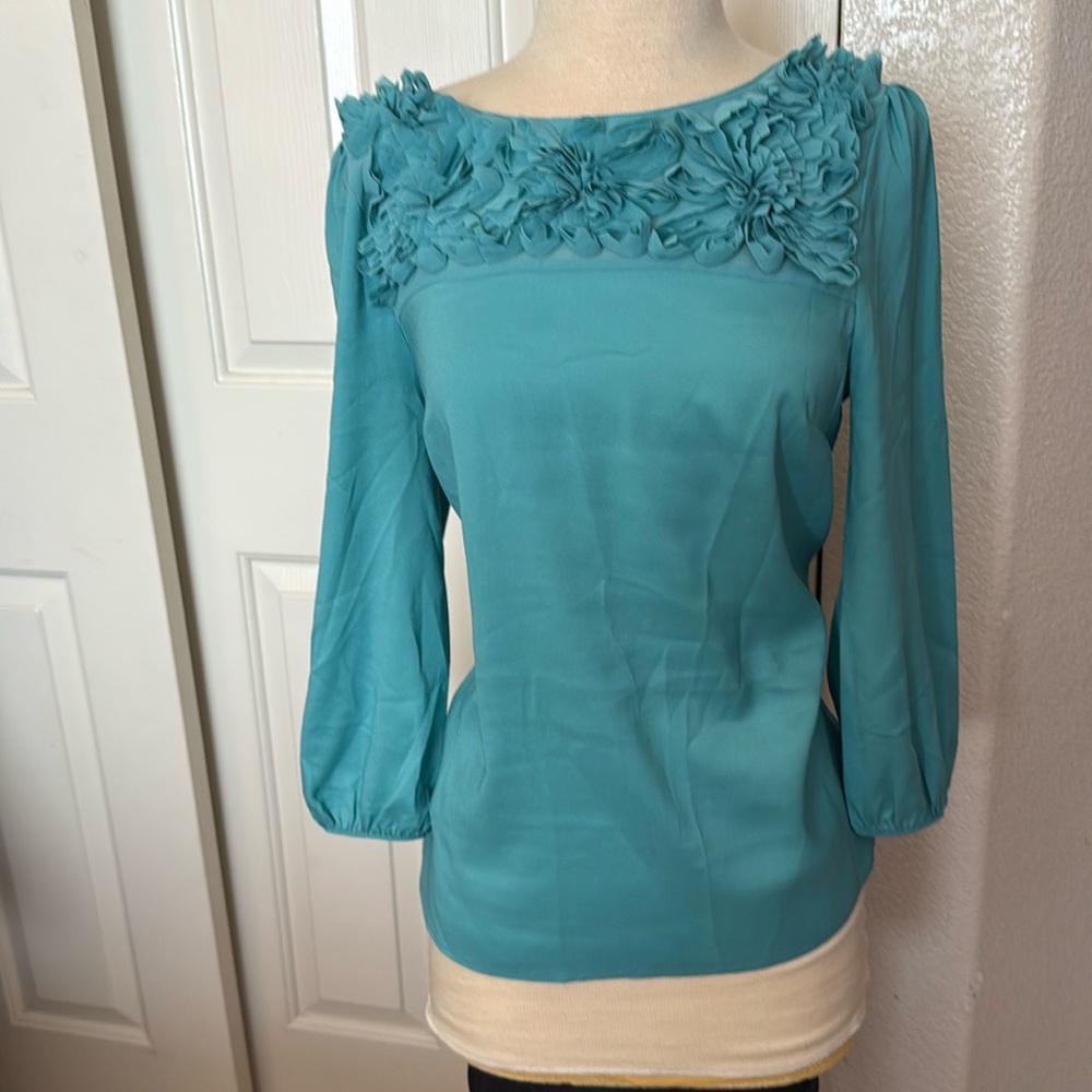 Ann Taylor blouse size small teal
Worn one time, in great condition